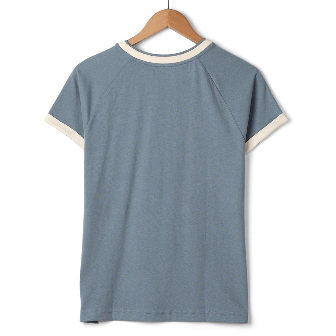 Back view of a womens Saltrock blue Links short sleeve t-shirt with cream trim on a wooden hanger against a white background
