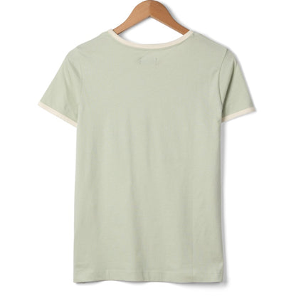 Back view of a womens Saltrock short sleeve Golden Hour t-shirt in Light Green on a hanger with a white background