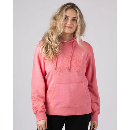 Front view of a woman wearing a Saltrock Trader Tonal bright pink pop hoodie against a plain background
