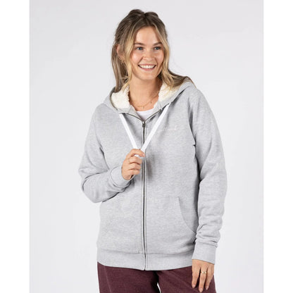 Front view of a woman wearing a Saltrock full zip Velator borg lined grey hoodie on a light grey background