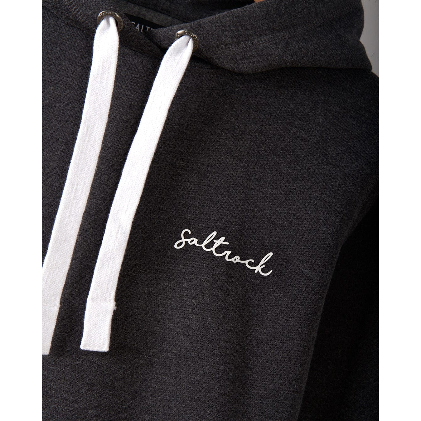 Dark Grey womens pop hoodie with white drawstrings and 'Saltrock' logo on a plain background