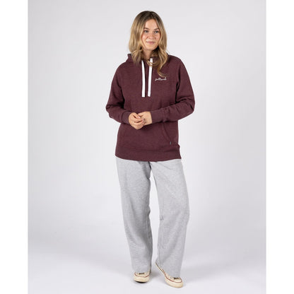 A woman wearing a Saltrock Velator hoodie in Dark Purple, with grey jogger trousers and trainers.