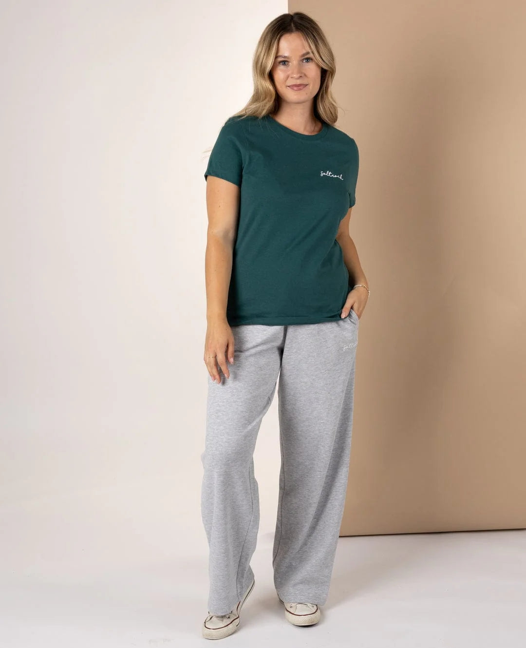 Saltrock womens Velator t-shirt in Dark Teal on model with grey wide-leg sweatpants casual front view