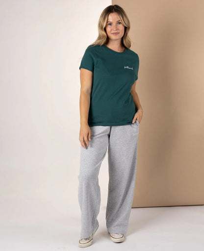 Saltrock womens Velator t-shirt in Dark Teal on model with grey wide-leg sweatpants casual front view