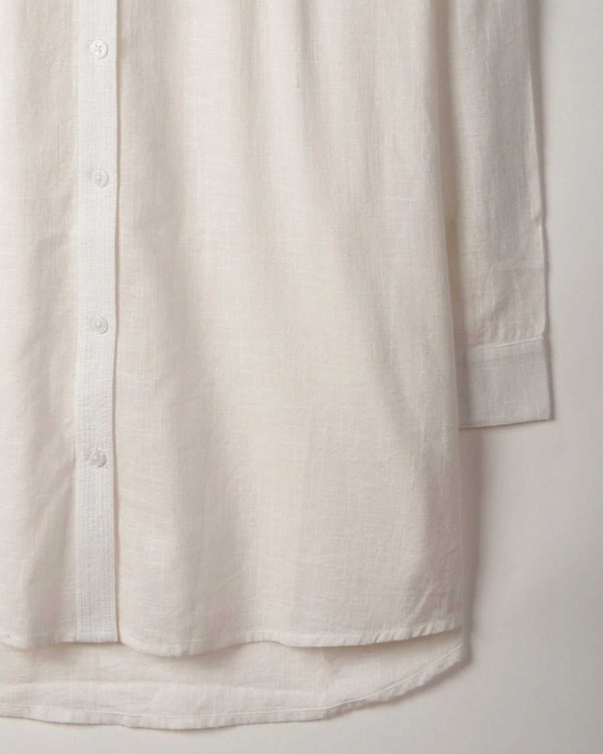 Women's Saltrock white longline Karthi shirt with back droptail.