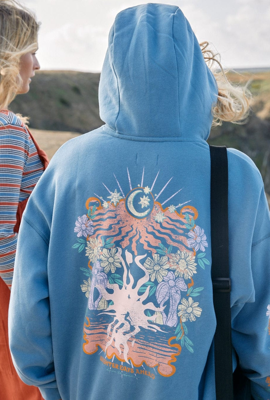 Women's Saltrock Better Days hooded sweatshirt in blue with floral moon print.
