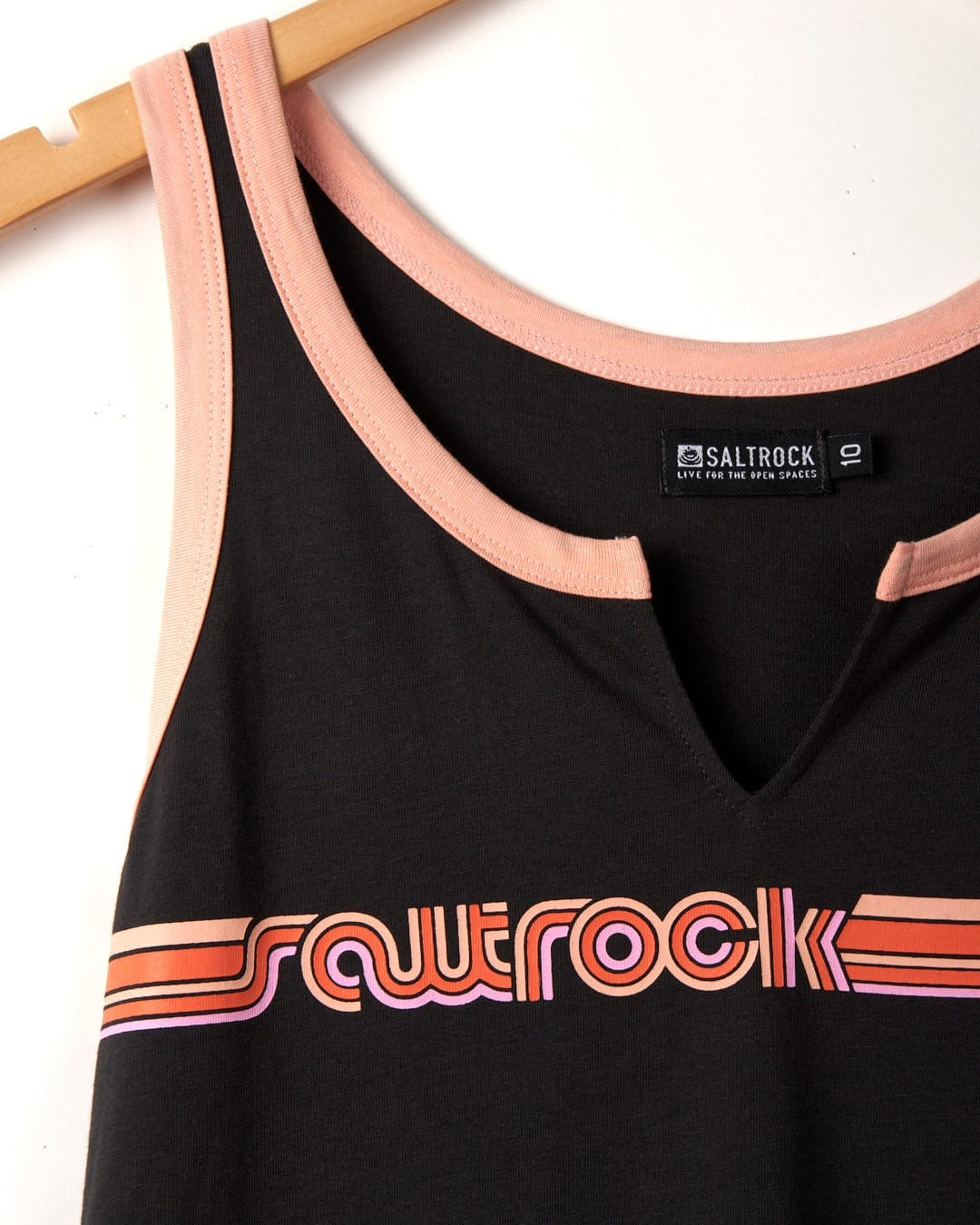 Dark Grey women's vest from Saltrock with contrasting peach coloured trim, notch neckline and retro style logo print on the chest.