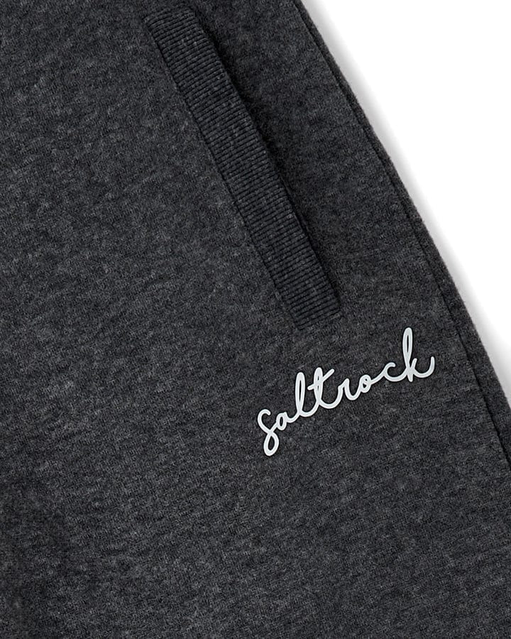 Saltrock women's Velator jogger sweatpants in Dark Grey with raised printed logo and hip pockets.