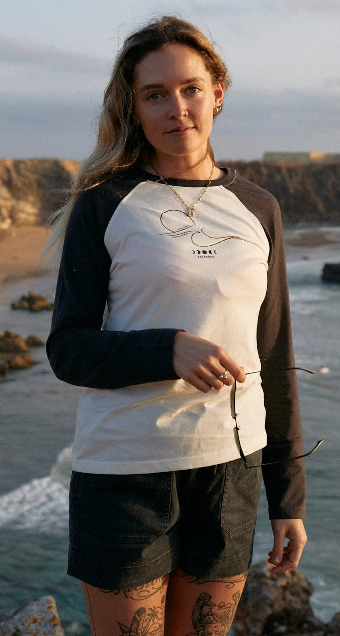 Women's Saltrock long sleeve raglan style t-shirt in white with dark grey sleeves and High Tides print on the chest.