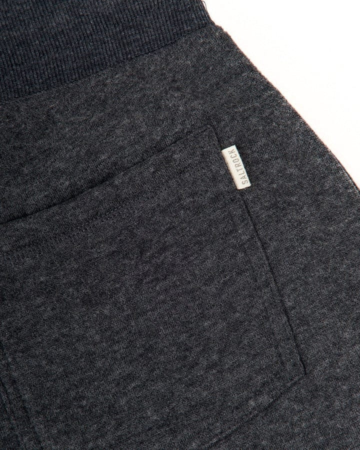 Women's elasticated waist jogger trousers from Saltrock in Dark Grey with back pockets and logo label.