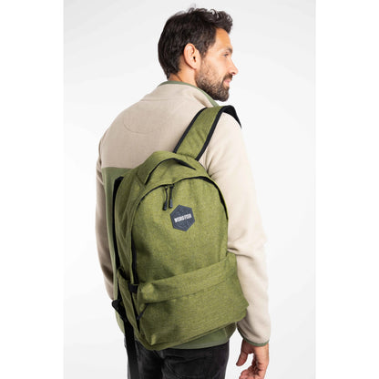 Man wearing a green Weird Fish Nevis backpack on a white background