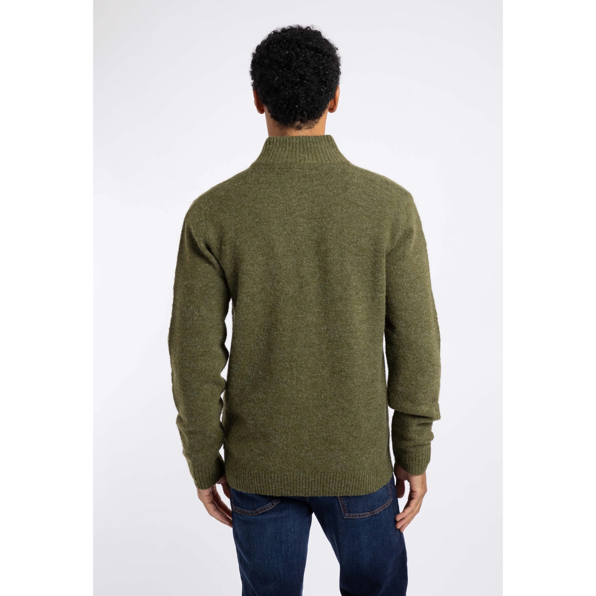 Back view of a man wearing a Weird Fish 1/4 zip Altwood knitted jumper in Winter Green.