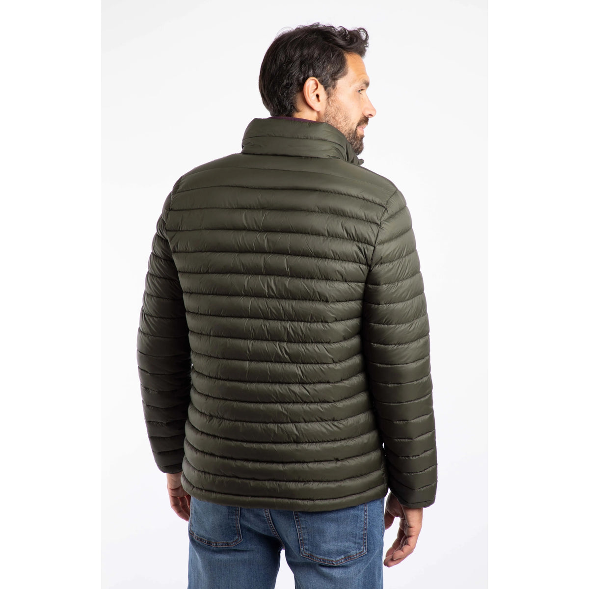 Back view of a man wearing a Weird Fish Crantock padded showerproof jacket in Anthracite 