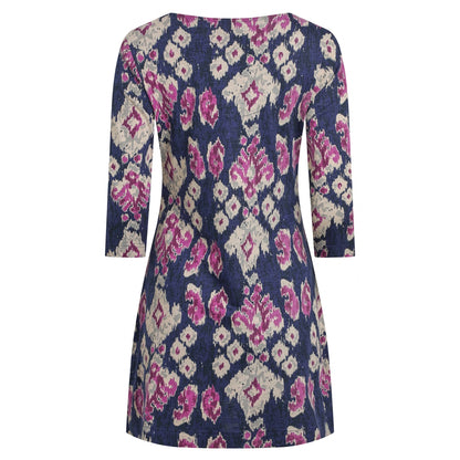 Back view of a womens Weird Fish Arielle tunic in petrol blue with a pink-purple abstract pattern on a white background