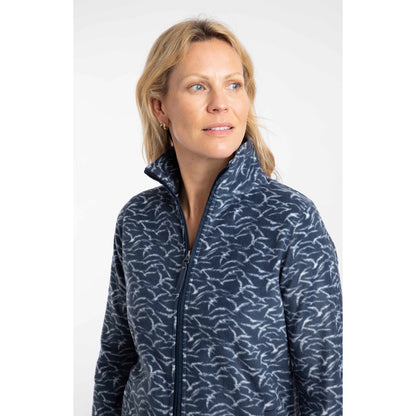 Close-up view of a woman wearing a Weird Fish full zip Rochelle microfleece in Night Blue with a gull bird print.