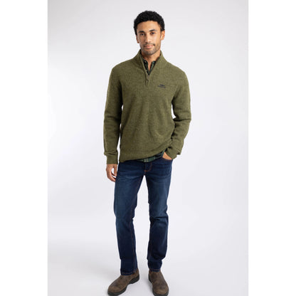 Front view of a man wearing a Weird Fish 1/4 zip Altwood knitted jumper in Winter Green with blue jeans and brown boots.