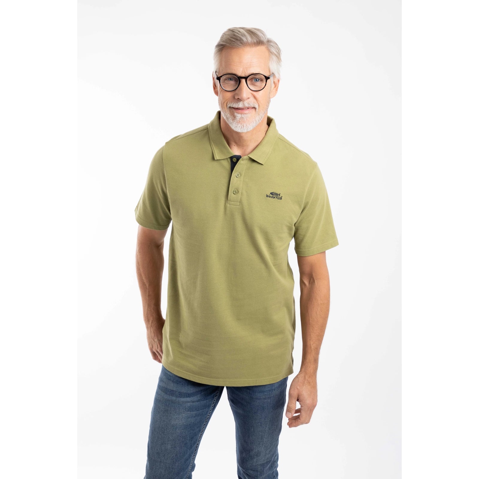Front view of a man wearing a Weird Fish short sleeve Miles polo shirt in Washed Oak Green.