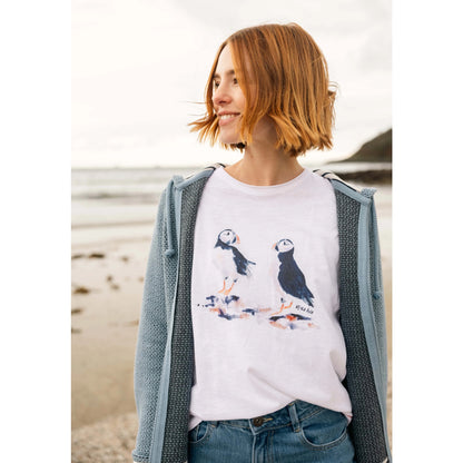 Main front view of a woman wearing a Weird Fish white Puffin print t-shirt.