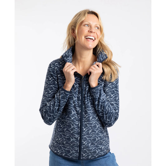 Front view of a woman wearing a Weird Fish full zip Rochelle microfleece in Night Blue with a gull bird print.