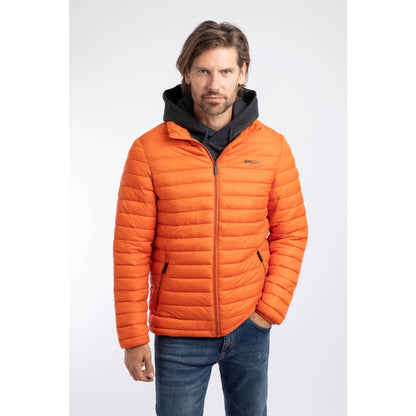 Front view of a man wearing a Weird Fish Crantock padded lightweight showerproof jacket in bright Koi Orange.