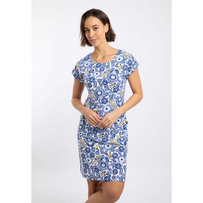 Front view of a woman wearing a Weird Fish short sleeve Tallahassee dress in Sapphire Blue featuring an abstract floral print and front pockets.