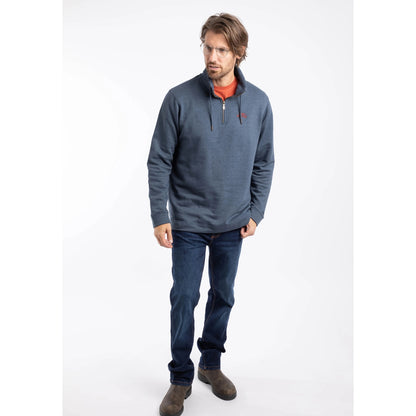 Man wearing a Weird Fish navy blue Brampton sweatshirt with a logo on a white background