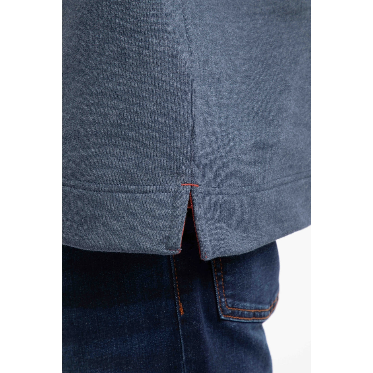Close-up of a navy blue sweatshirt with side slits on a white background