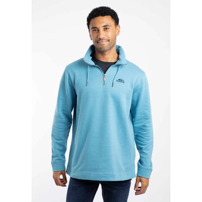 Man wearing a Weird Fish Smoked Blue Brampton pullover sweatshirt with a logo on a white background