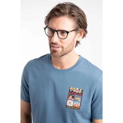 Close-up view of a man wearing a Weird Fish mens short sleeve Chili Kippers t-shirt in Washed Blue.
