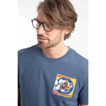 Close-up view of a man wearing a Weird Fish short sleeve The Whoot 'My Heneration' printed t-shirt in Ensign Blue