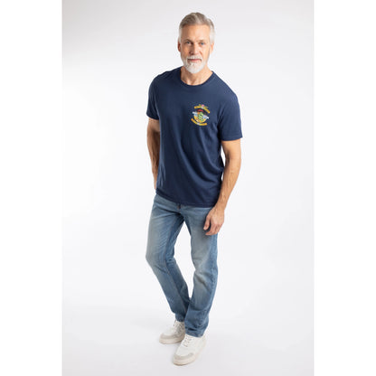 A man wearing a Weird Fish Cod and Chips print short sleeve t-shirt in Dark Blue with blue jeans and white shoes