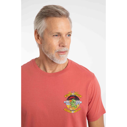 Close-up view of a man wearing a Weird Fish Cod and Chips print short sleeve t-shirt in Nantucket Red 