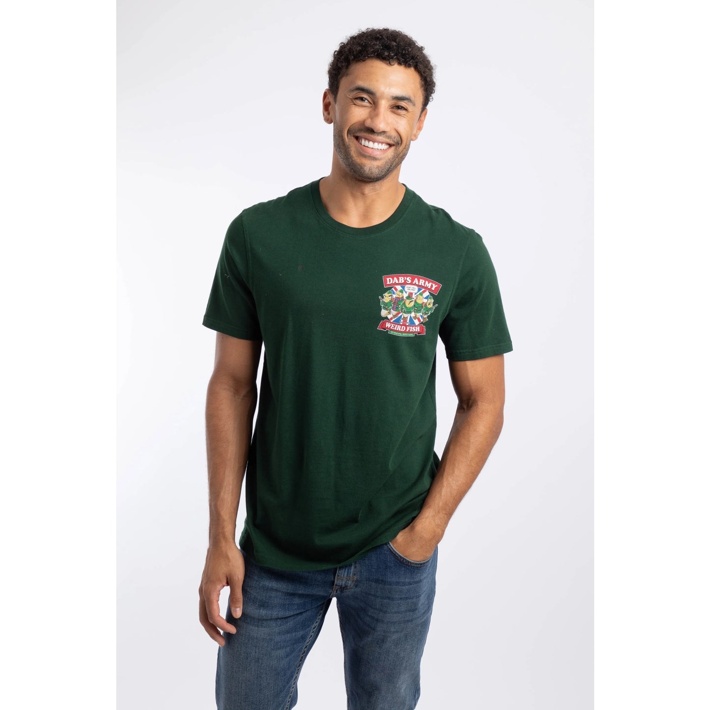 Front view of a man wearing a Weird Fish Dab's Army printed t-shirt, in beetle green, featuring a small Dad's Army TV show themed print on one side of the chest with the lines: "Dab's Army" "Don't Tell Him, Pike!", "Weird Fish".