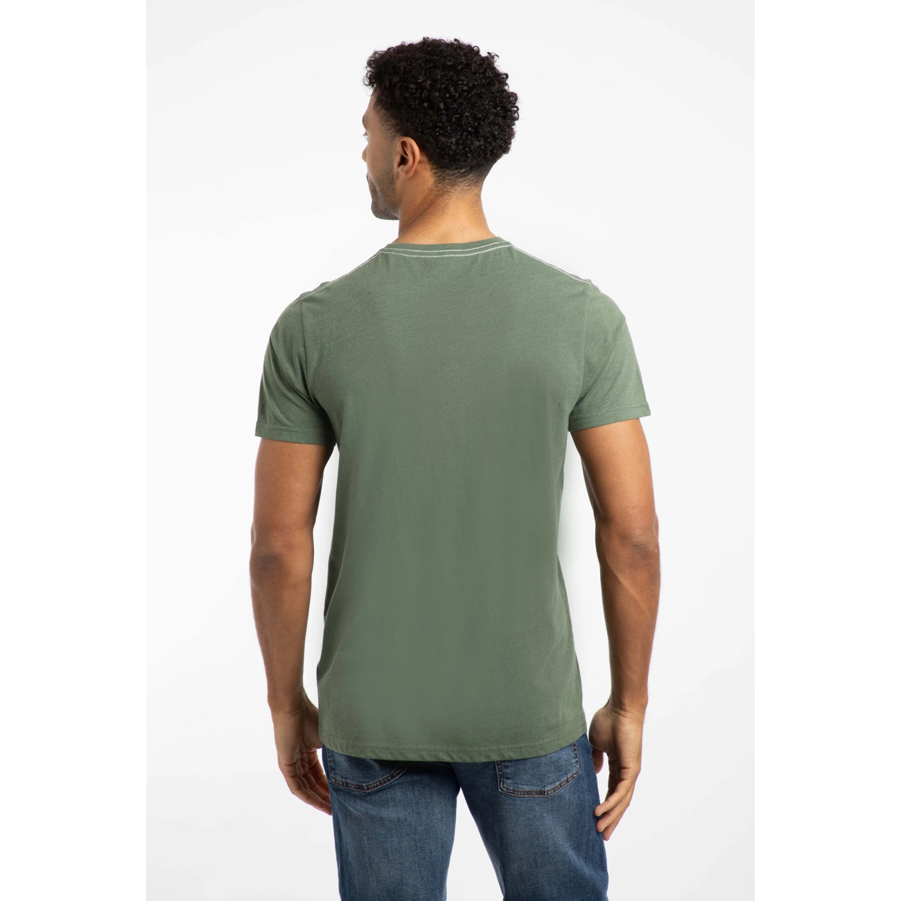 Back view of a man wearing a Deep Lichen Green colour Weird Fish short sleeve Double Fish t-shirt with blue jeans on a white background.