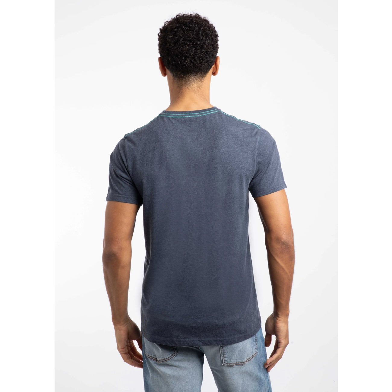 Back view of a man wearing a short sleeve navy Weird Fish Double Fish tee on a white background