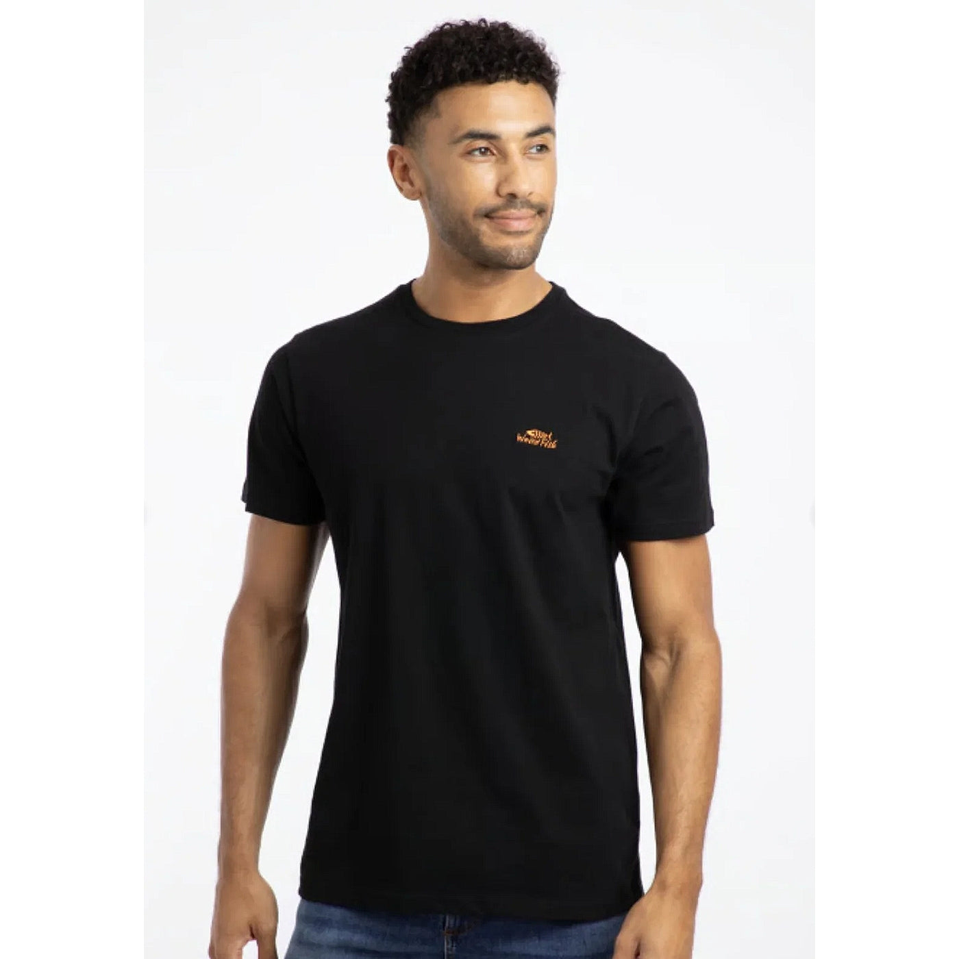 Front view of a man wearing a Weird Fish short sleeve Fished t-shirt in black with a small orange logo on the chest.