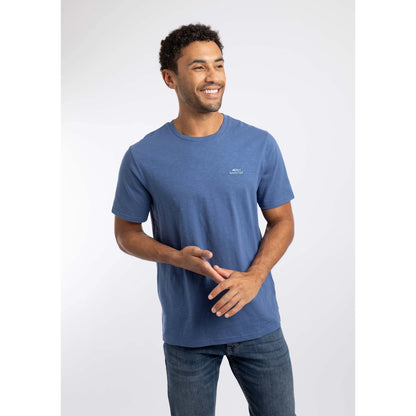 Front view of a man wearing a Weird Fish short sleeve Fished t-shirt in Faded Blue with a small logo on the chest.