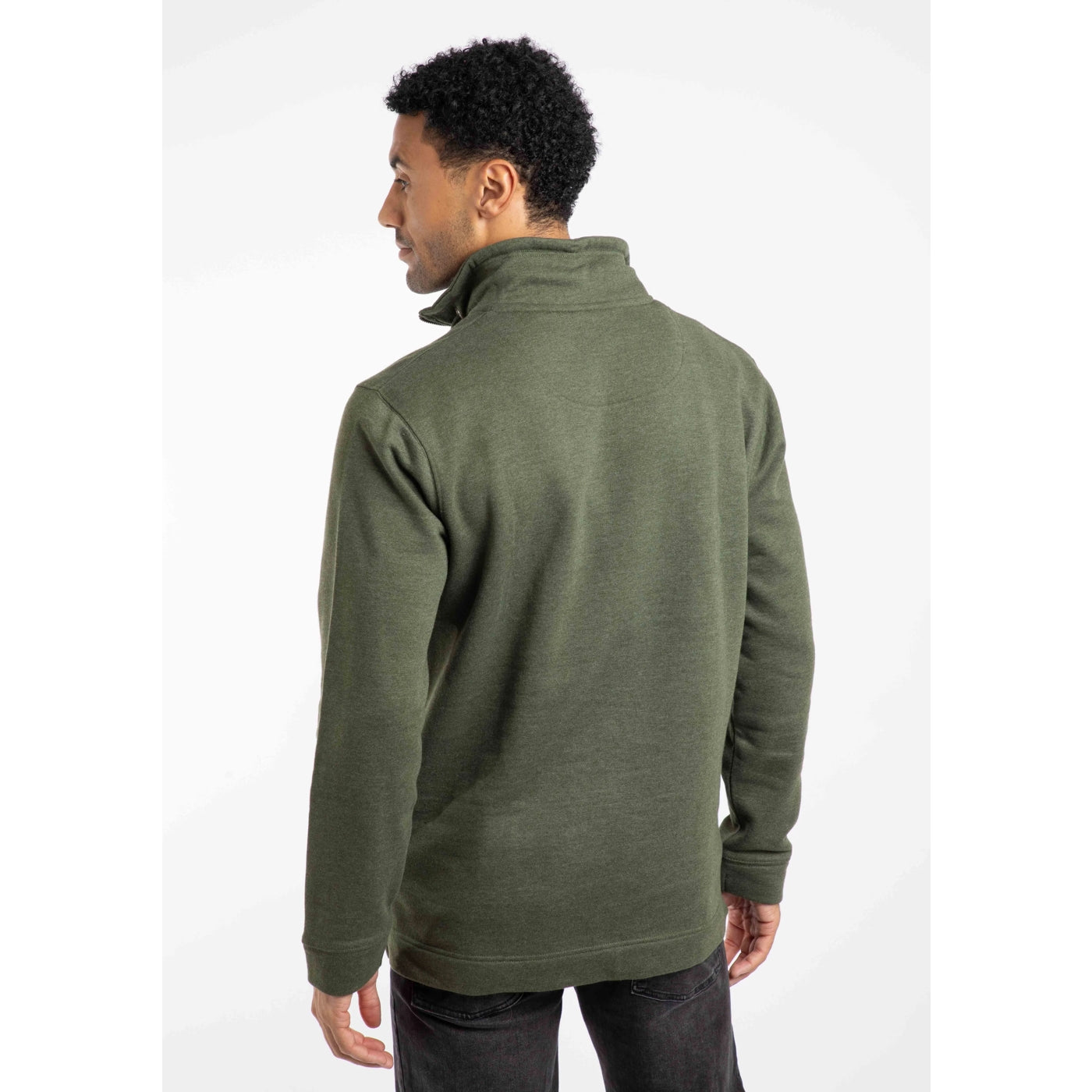 Back view of a man wearing a green Weird Fish sweatshirt on a white background