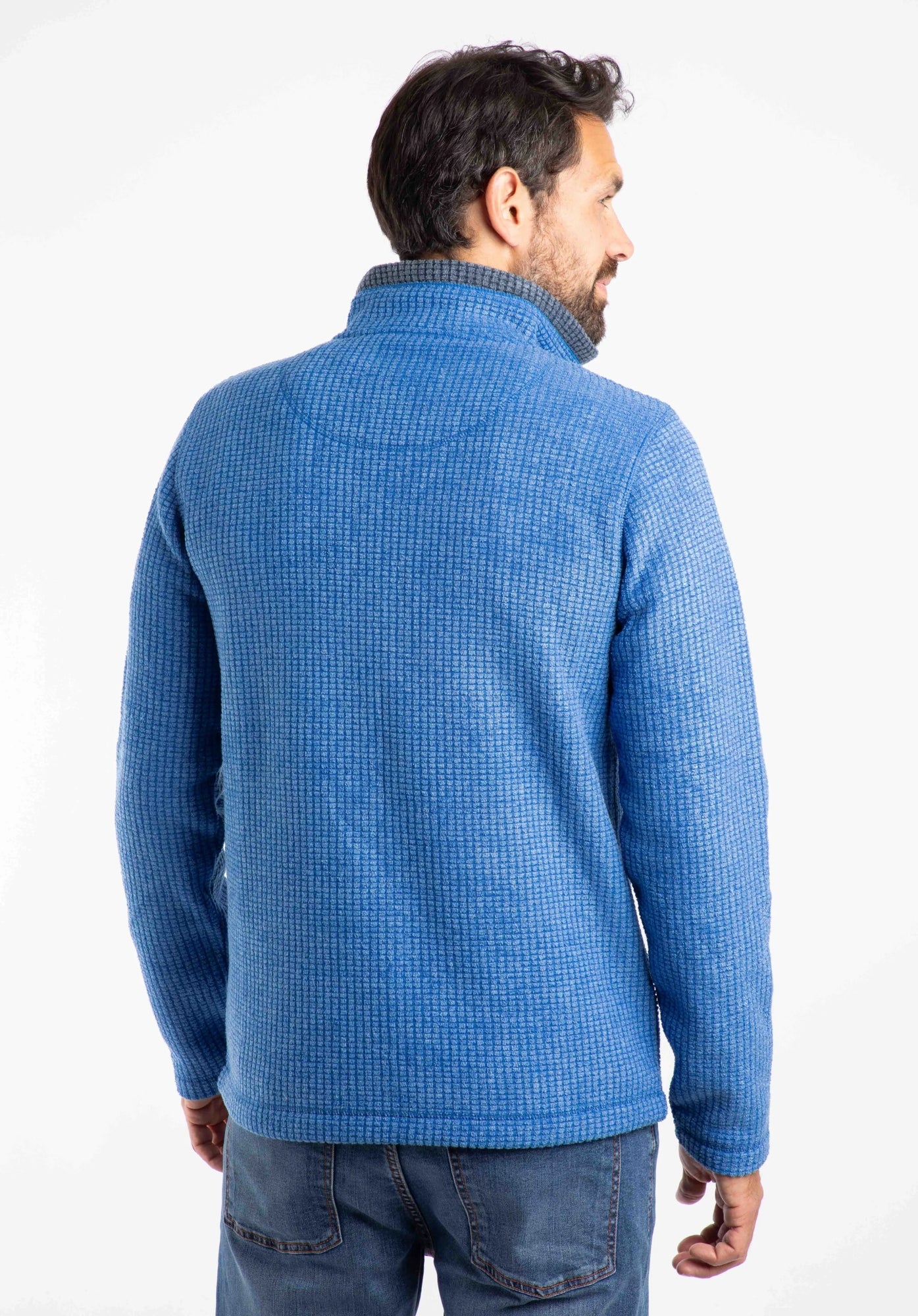 Weird Fish mens Newark grid fleece in Blue shown from back on model with high collar and textured fabric