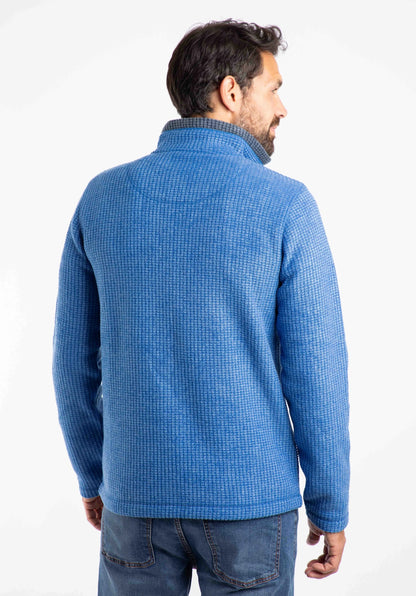 Weird Fish mens Newark grid fleece in Blue shown from back on model with high collar and textured fabric
