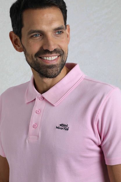 Weird Fish mens pink polo shirt with button-up collar and embroidered logo on chest