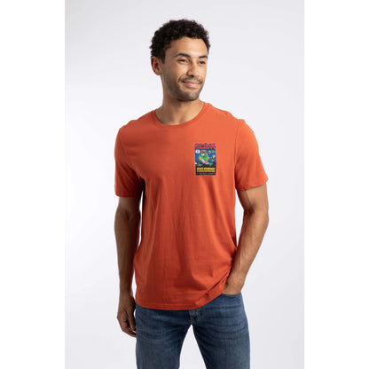 Front view of a man wearing a Weird Fish Space Coddity printed t-shirt in a Rust Leaves shade of orange.