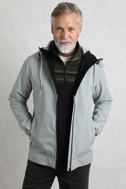 Weird Fish mens waterproof jacket grey worn by man with zip and hood in casual style