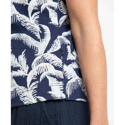 Close-up of a womens Weird Fish Alia t-shirt in Ink blue with an ecru palm leaf pattern on a plain background
