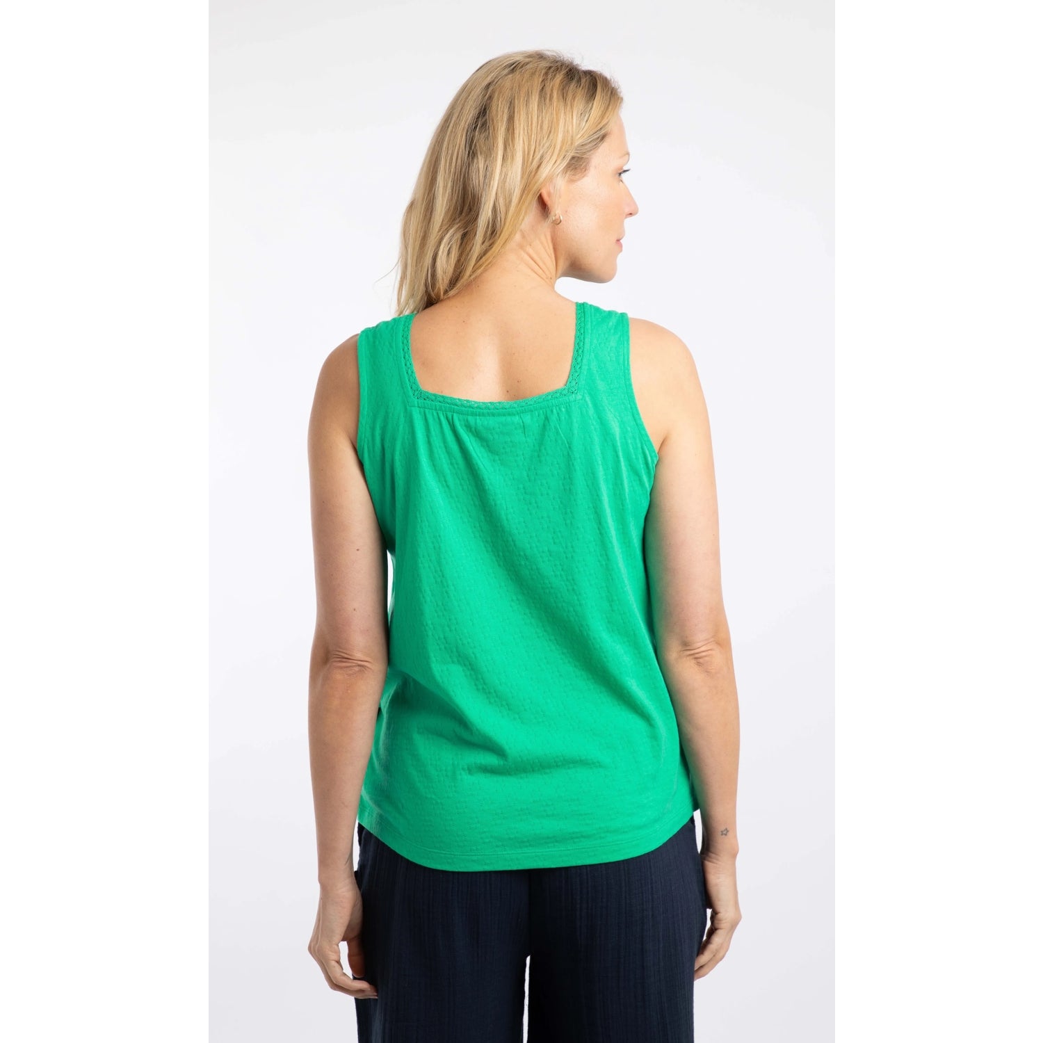 Back view of a woman wearing a Weird Fish Chelle square neck vest in Gumdrop Green