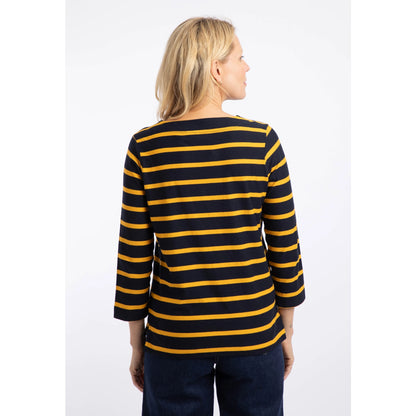 Back view of a woman wearing a Weird Fish Saffira 3/4 length sleeve top in Midnight Navy with Gold Yellow stripes.