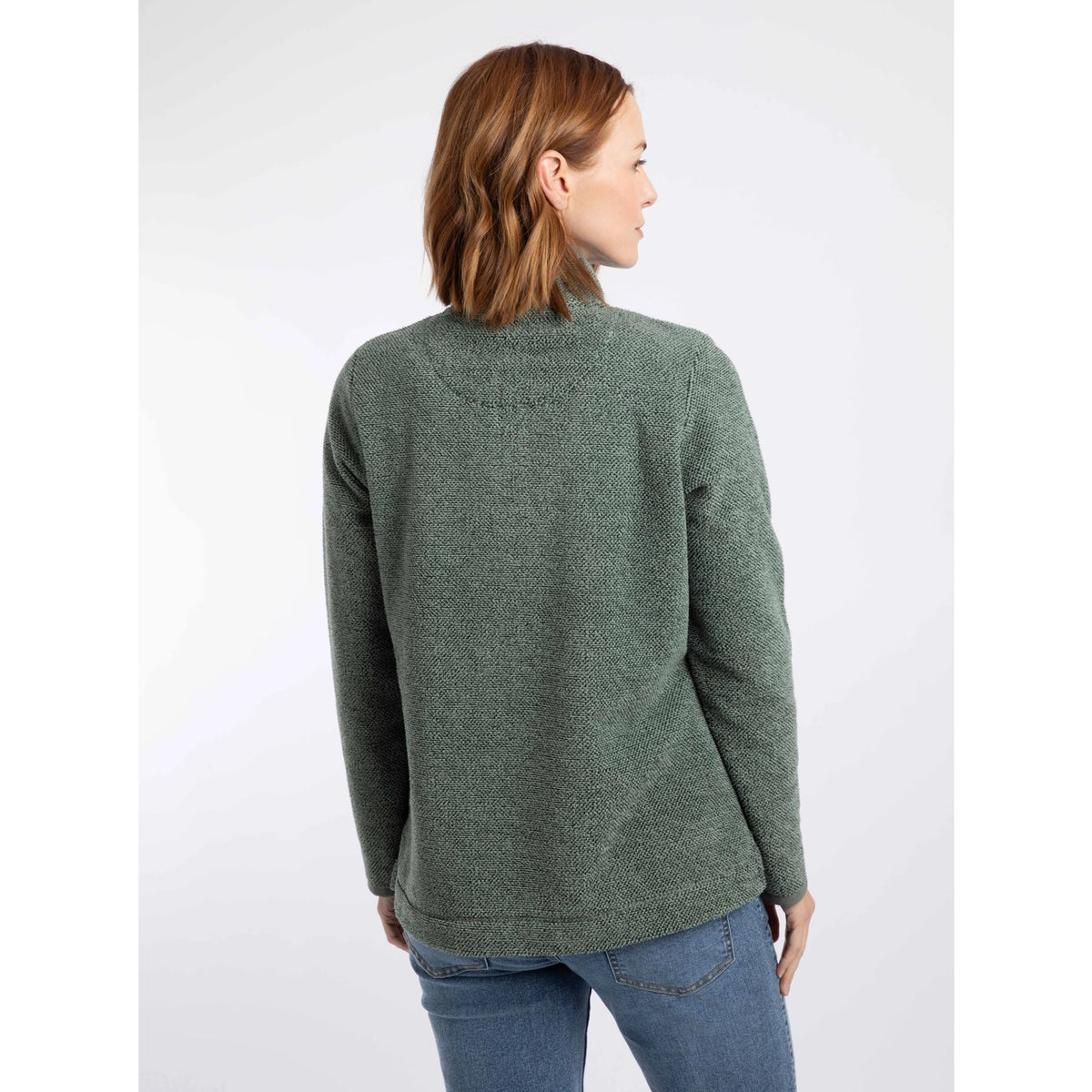 Back view of a woman wearing a Weird Fish 1/4 zip Sarah fleece in Military Green