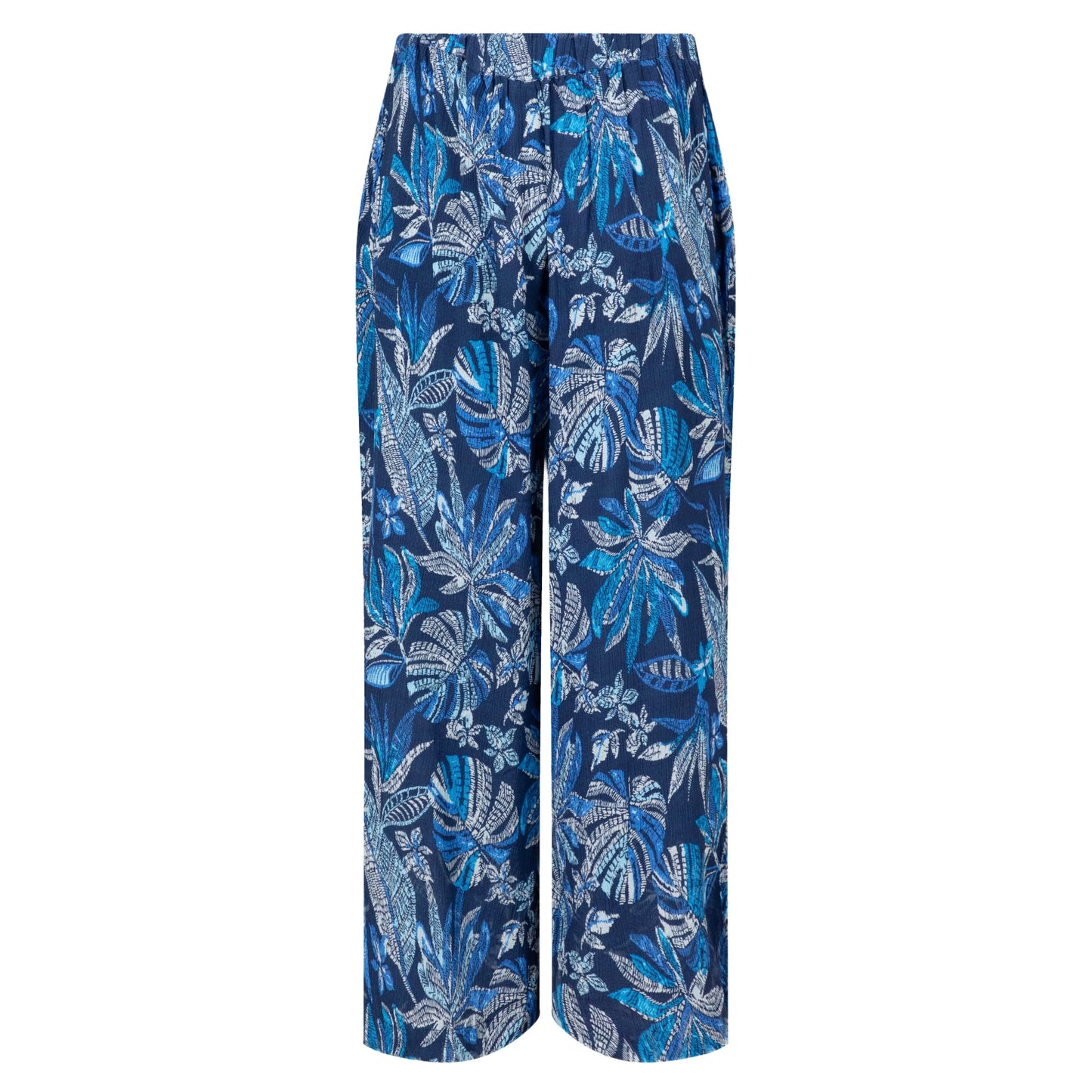 Back view of a pair of women's Weird Fish Sarita wide leg crinkle viscose cropped trousers in indigo blue with a tropical leaf pattern.