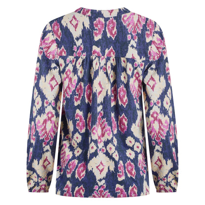 Back view of a womens Weird Fish Brooke long sleeve top in a blue and pink-purple abstract pattern on a white background