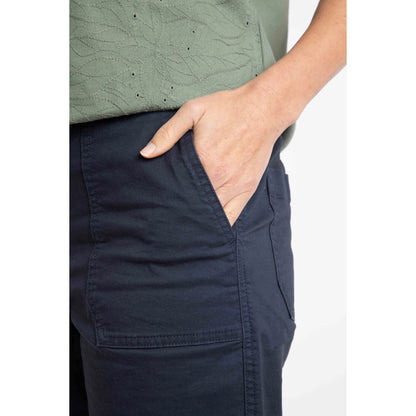 Close-up view of a hip pocket on a pair of womens Weird Fish flat front Kinnie shorts in navy with elastic waist and hip pockets.